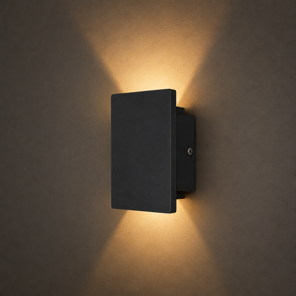Montierte schwarze Wandleuchte mit Auf-Ab-Licht und sichtbarer Befestigungsschraube