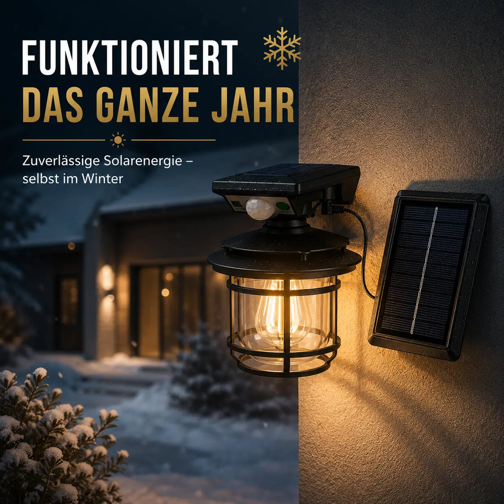 Solar Wandleuchte Laterne retro rund mit Bewegungsmelder schwarz (Halvoran), im Winter bei Schnee