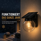 Solar Wandleuchte mit Glaskugel E27 schwarz (Belarion), im Winter bei Schnee