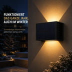Solar Wandleuchte mit Auf-Ab-Licht schwarz (Nerion), im Winter bei Schnee